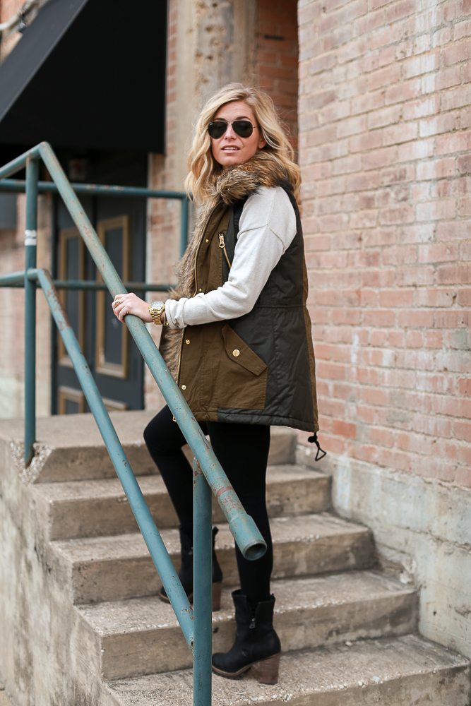 military vest with fur-black leggings-black combat boots-winter outfit idea-fashion blogger dallas