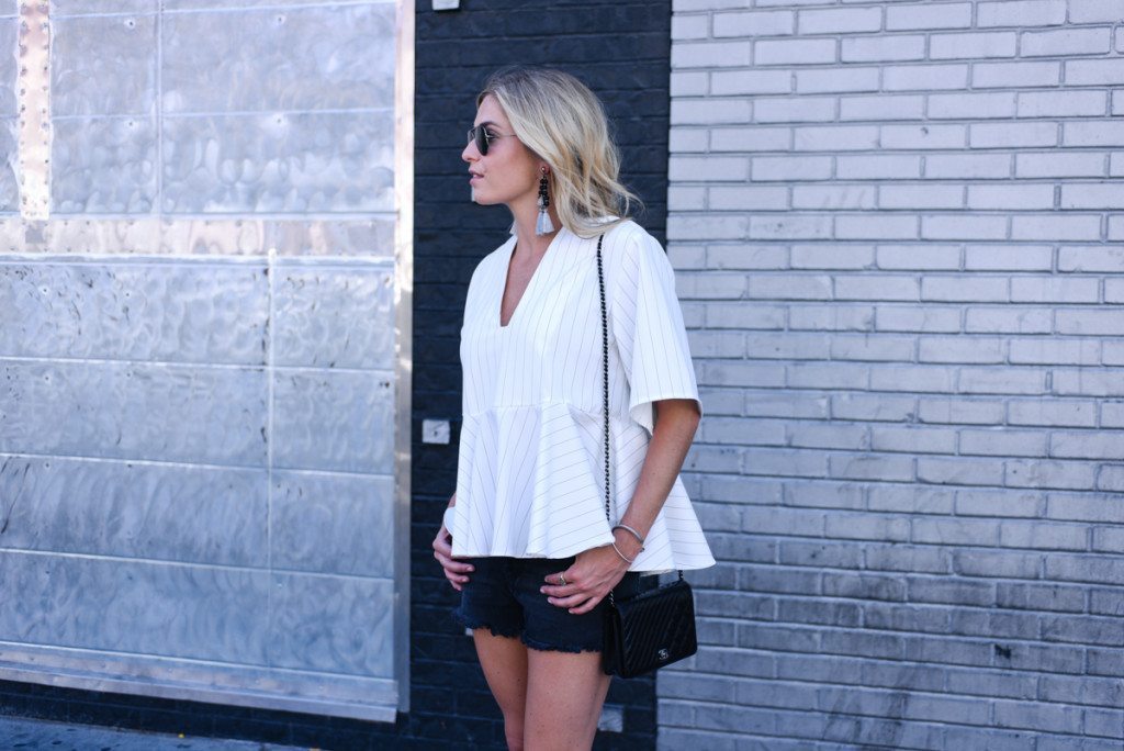 white peplum stripe top - free people black cutoff shorts - vegas outfit idea