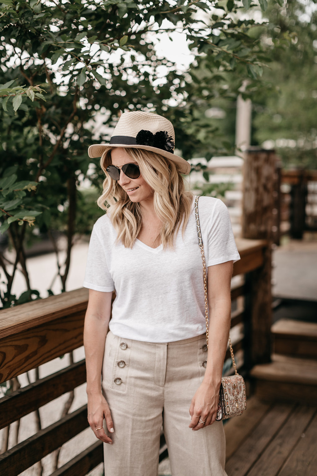 One Small Blonde | Brooke Burnett is wearing a basic white t-shirt and a wide leg sailor pants