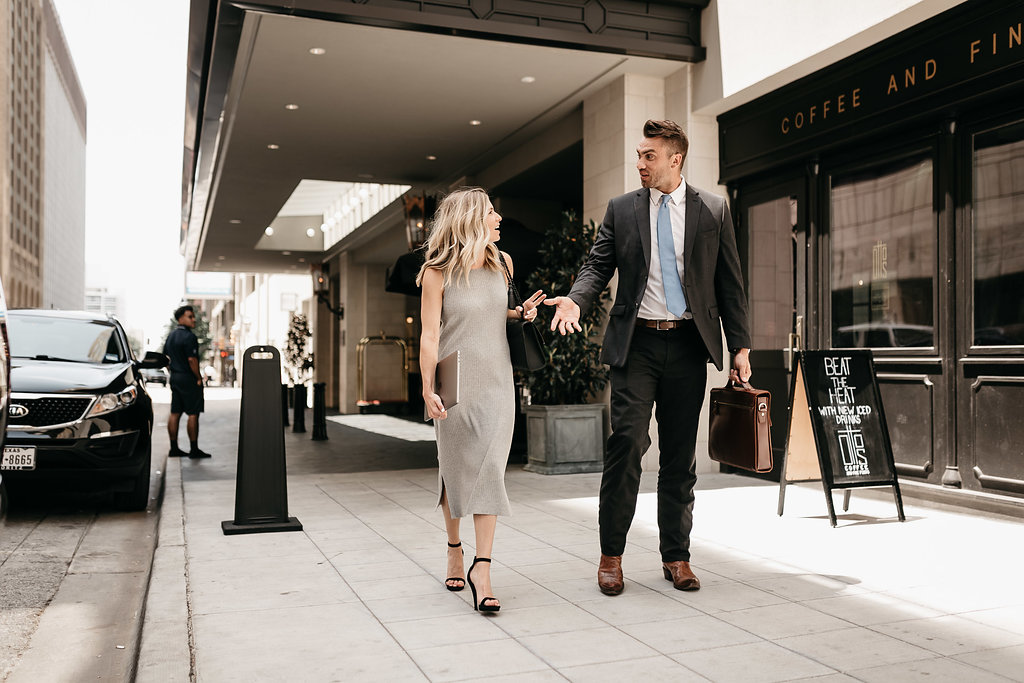 FINANCIAL ADVISOR and a woman walking on the street