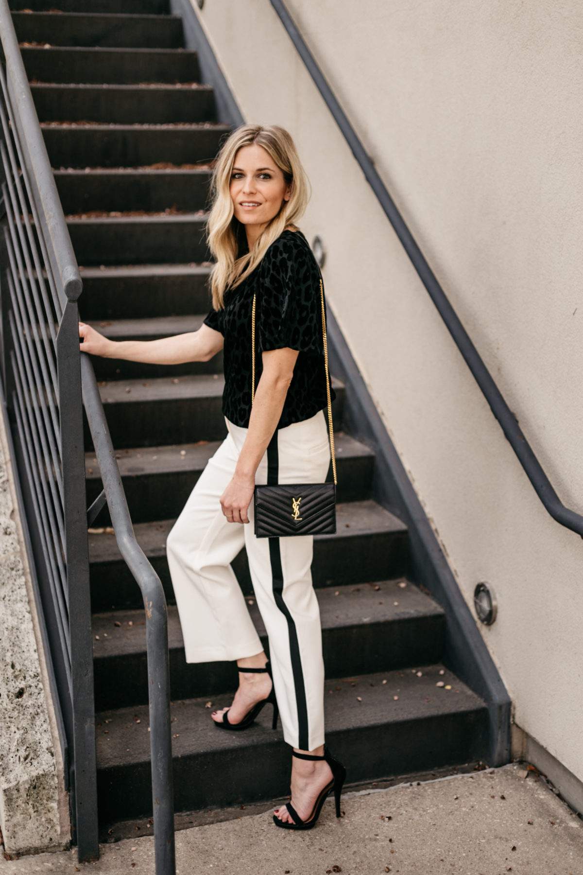 OUTFIT 3  White Wide Leg Stripe Pants // Black Short Sleeve Blouse // Black and Gold Crossbody Clutch // Black Strappy Heels