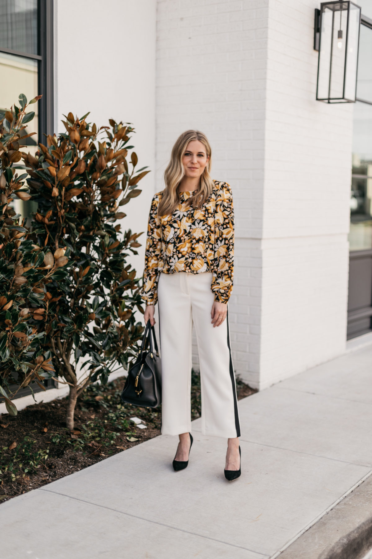 OUTFIT 2  White with Black Stripe Pants // Yellow and Black Floral Long Sleeve Blouse // Black Suede Heels // Black Work Bag