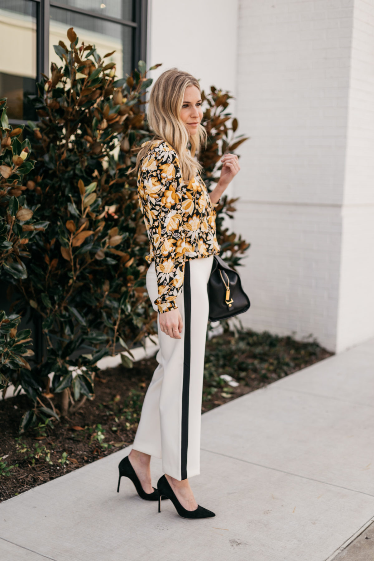 OUTFIT 2  White with Black Stripe Pants // Yellow and Black Floral Long Sleeve Blouse // Black Suede Heels // Black Work Bag